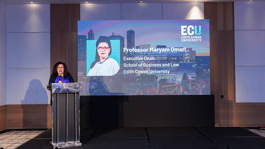 Woman speaking at event