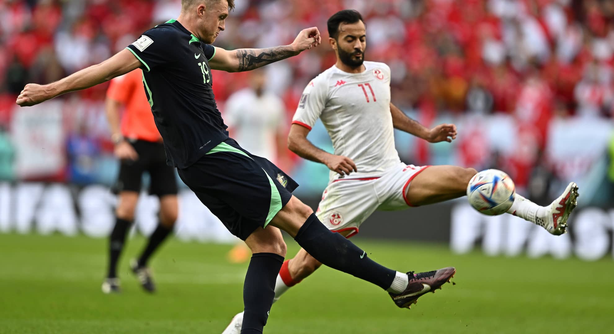 Australian soccer player Harry Souttar competes against Tunisia at the 2022 FIFA World Cup.