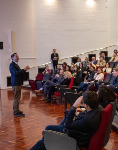 ben farr-wharton giving a speech to undergrad students