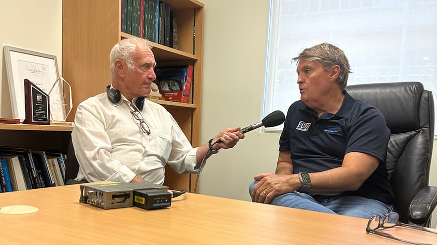 Image of Robyn Williams interviewing Dr Rob Newton