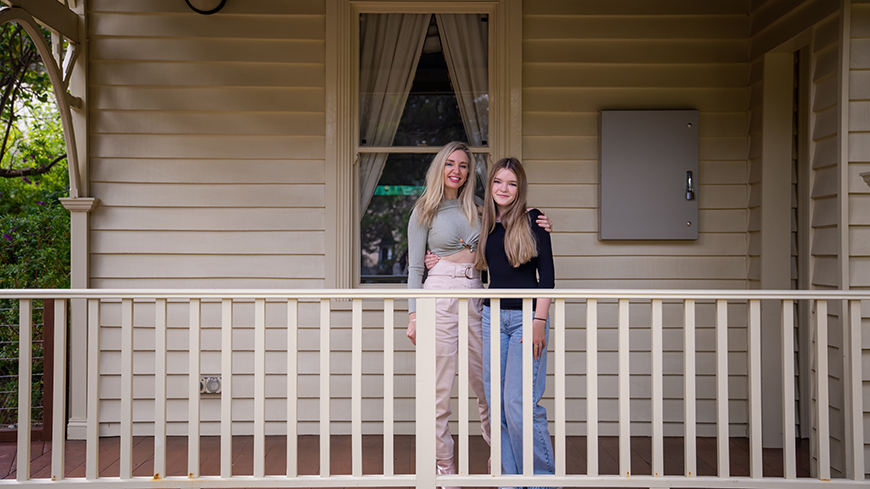 Ayla Lewkowski and her mum Joanne Colely in front of Edith Cowan House.