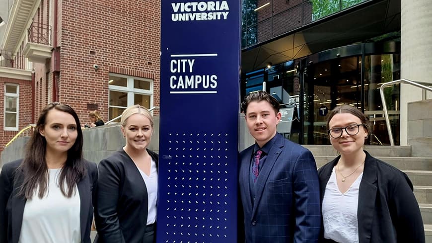 Jenna Long, Sara-Jane Dempsey, Jacob Orley and Olivia Caubo standing outside Victoria University.