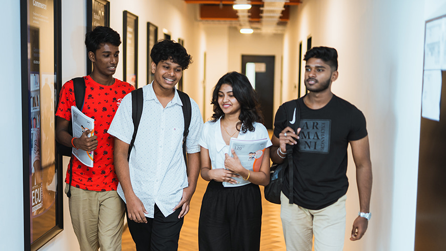 Students walking in corridor