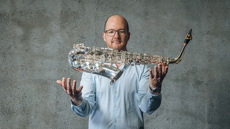 Dr Matt Styles with saxophone