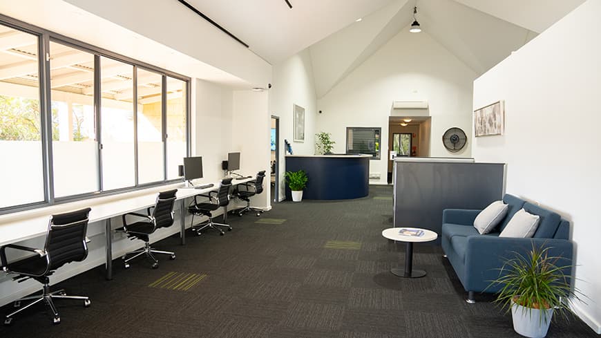 Study desks and reception inside learning centre