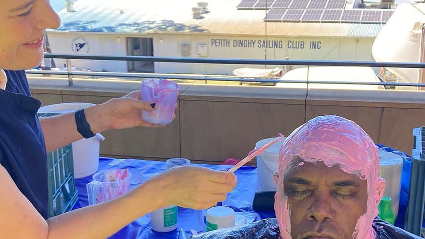 Dr Cassandra Tytler is pictured preparing a latex and plaster mask that Trevor Ryan performs in for the final video work.