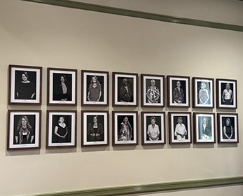 A wall display of the framed 2026 WAWHOF inductee photos 