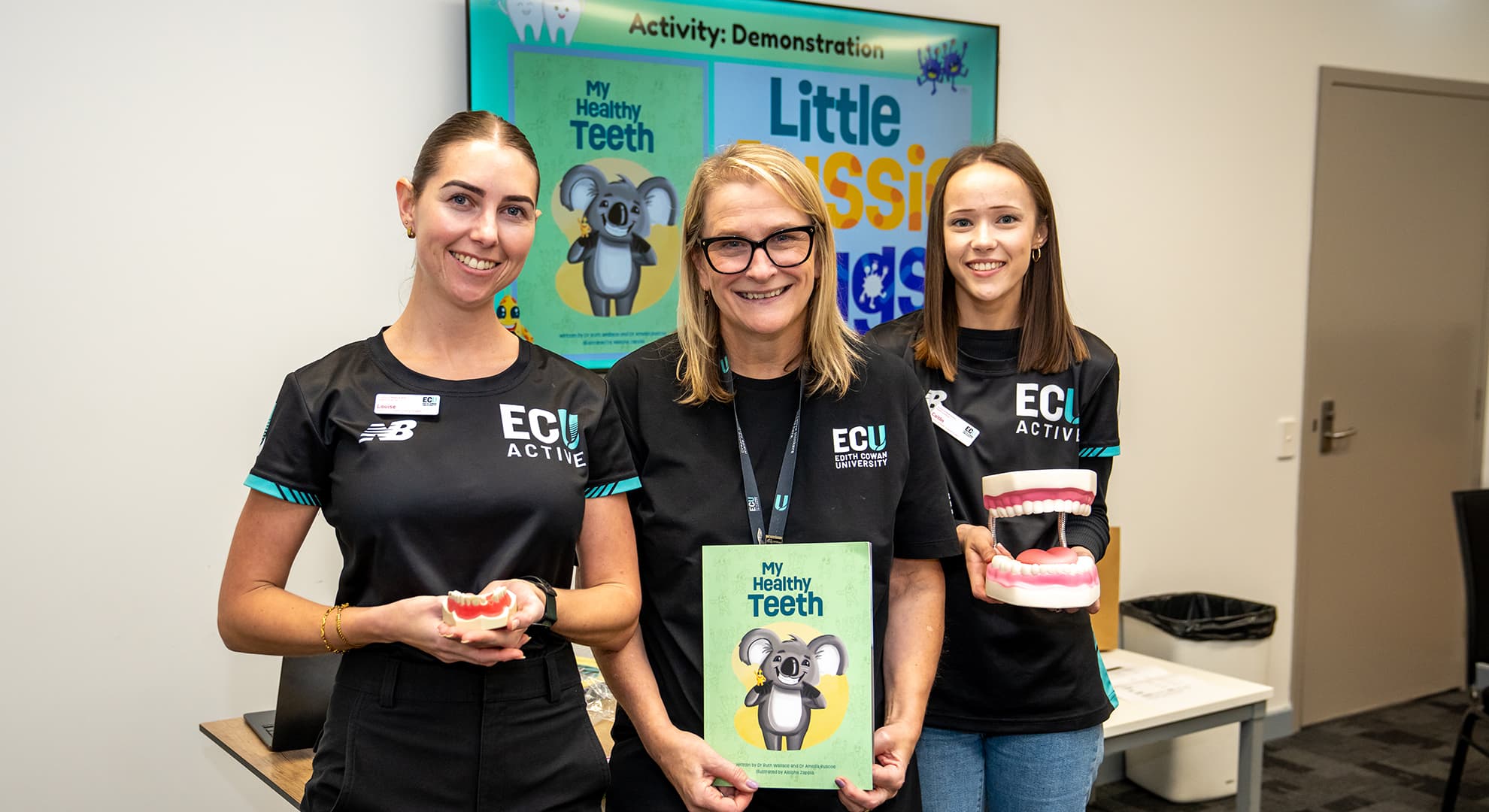 Three women at oral health workshop