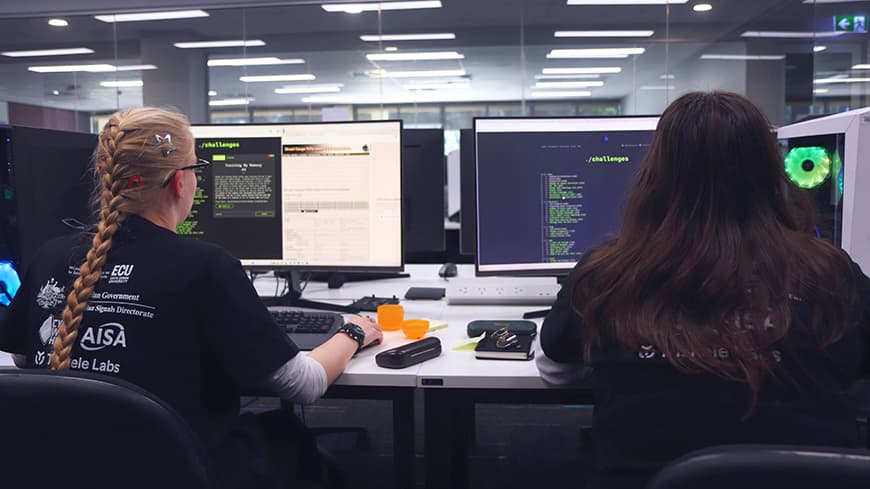 Girl sitting in front of computer