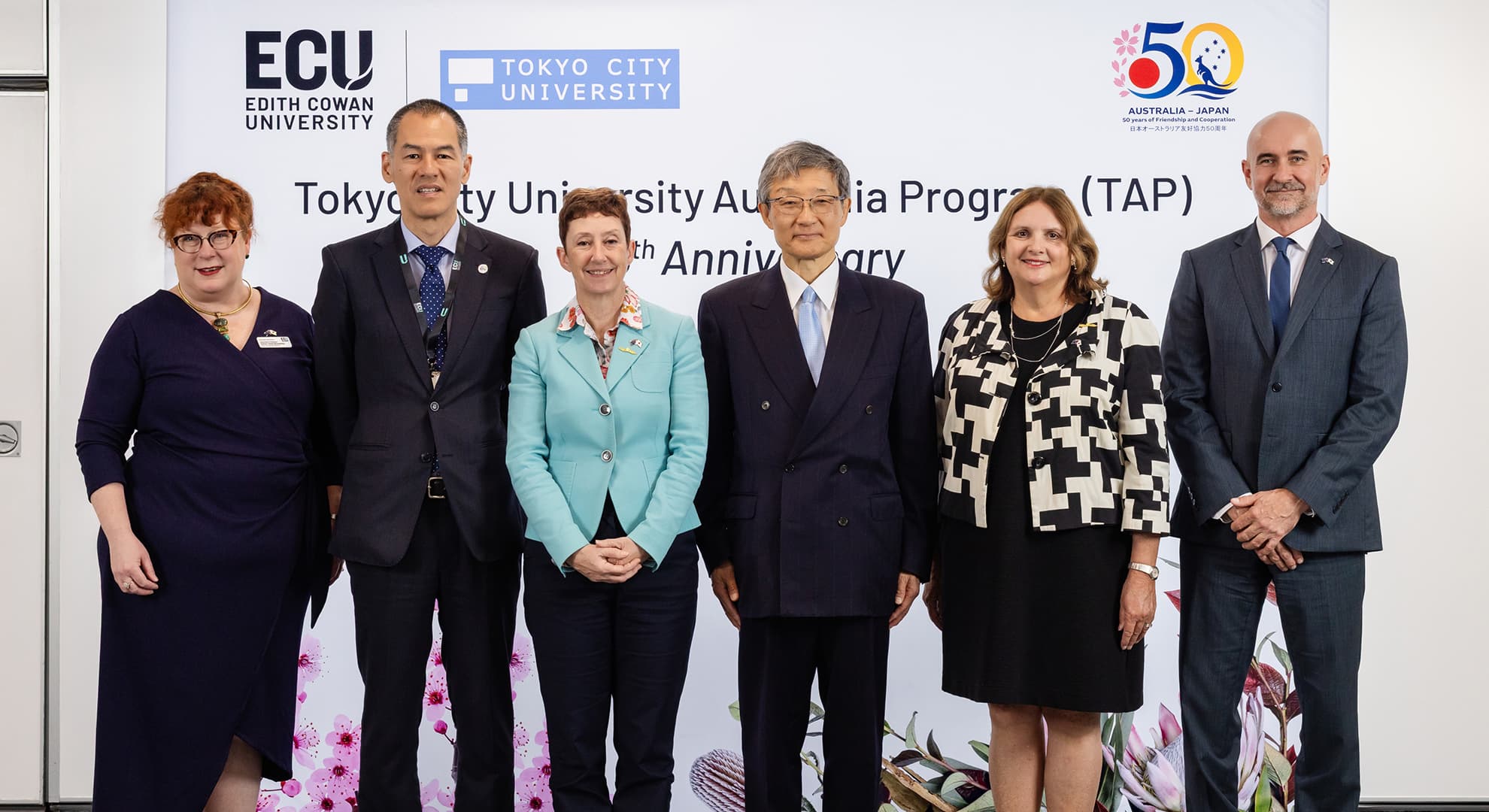A group of dignitaries posing for a group photo