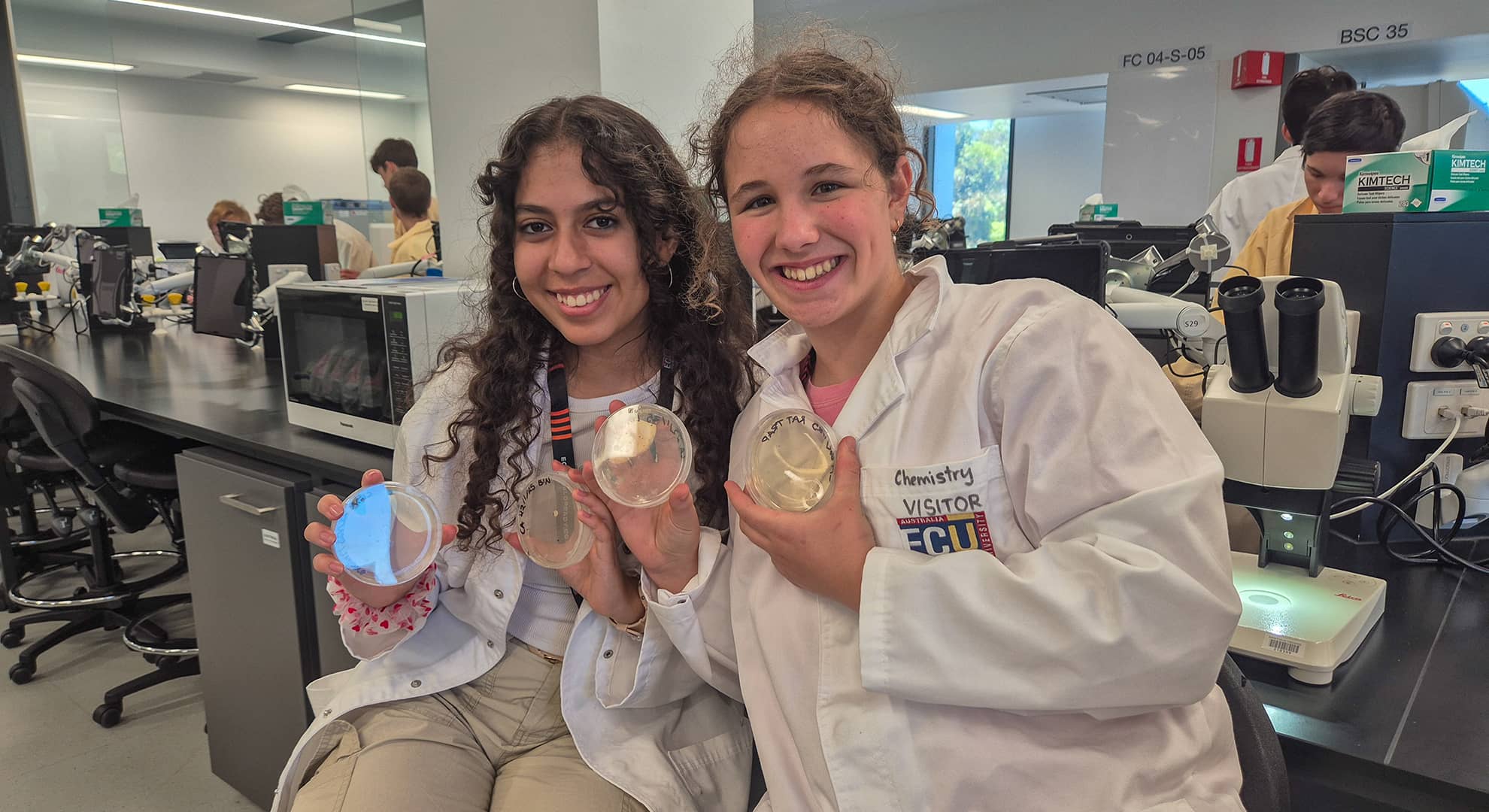 Two girls with science experiment