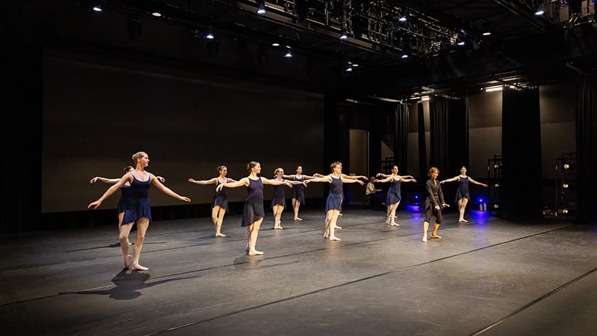WAAPA ballet dancers in a row across the stage. Image credit Stephen Heath