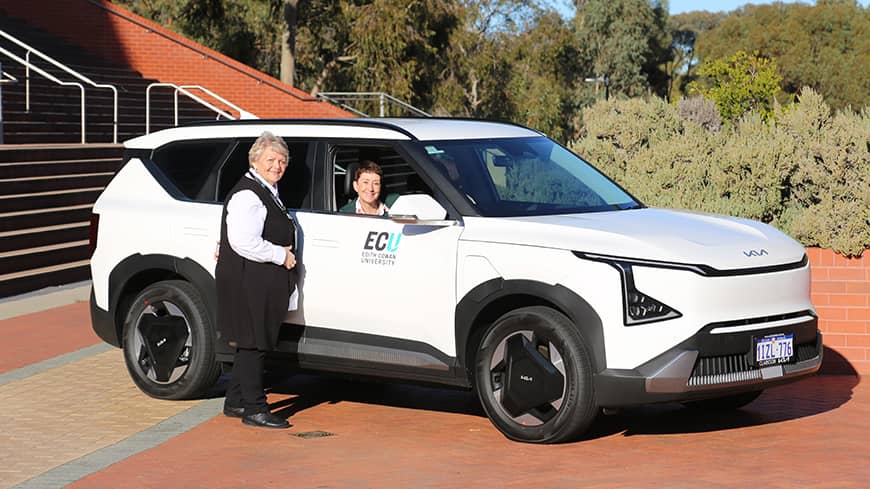 Professor Clare Pollock and Karen Gilmore with one of the new EVs.