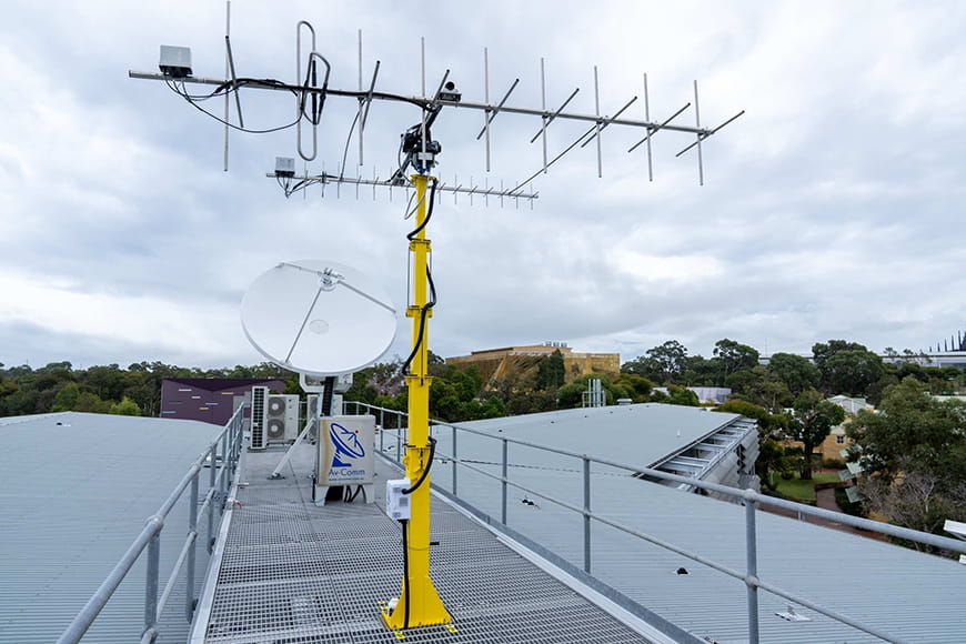 Satellite ground station and antenna system on top of building