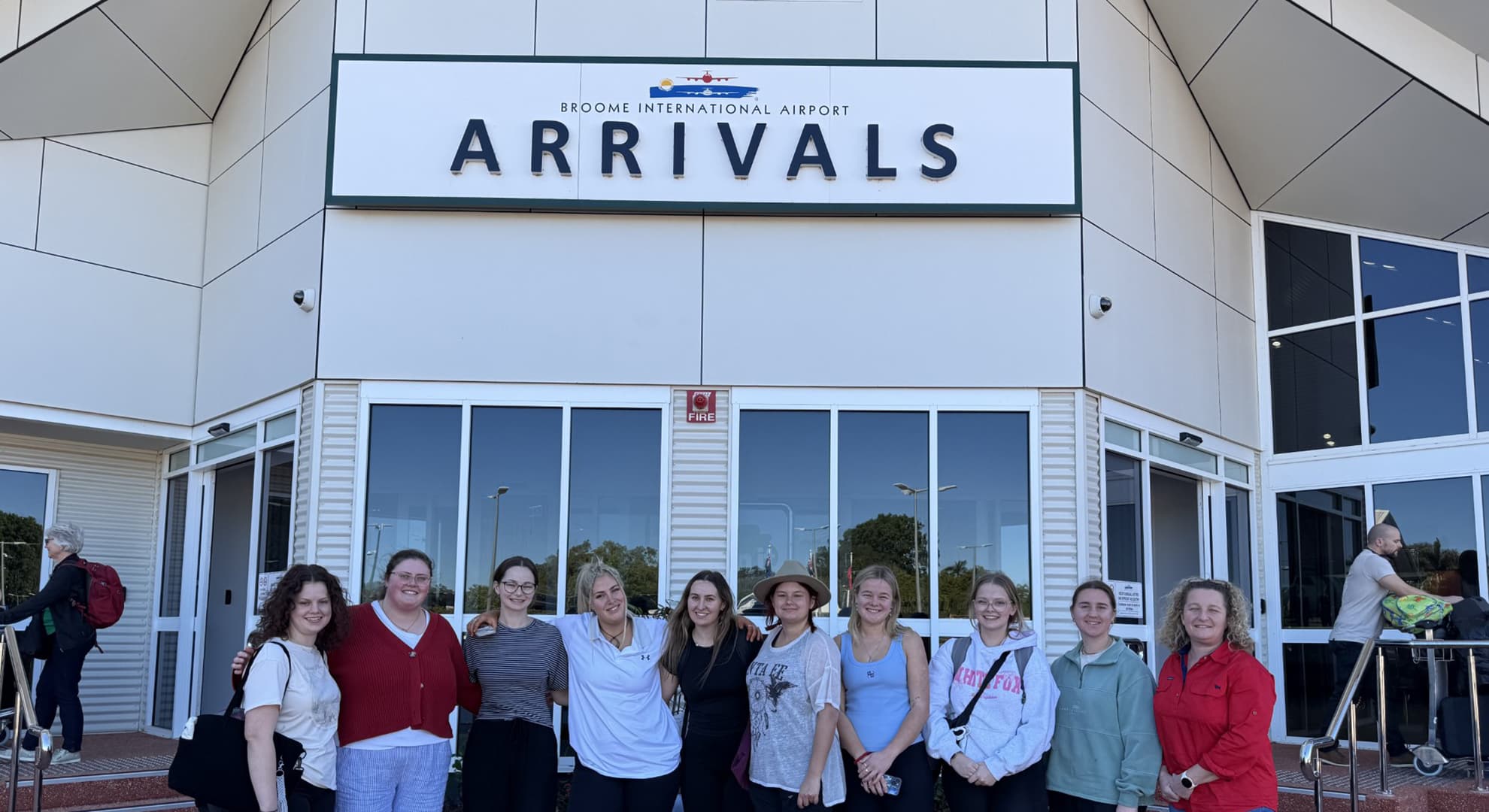 A group of students at the airport