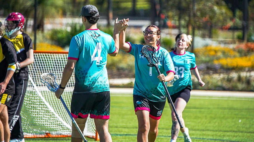 ECU students playing lacrosse at UniSport Nationals.