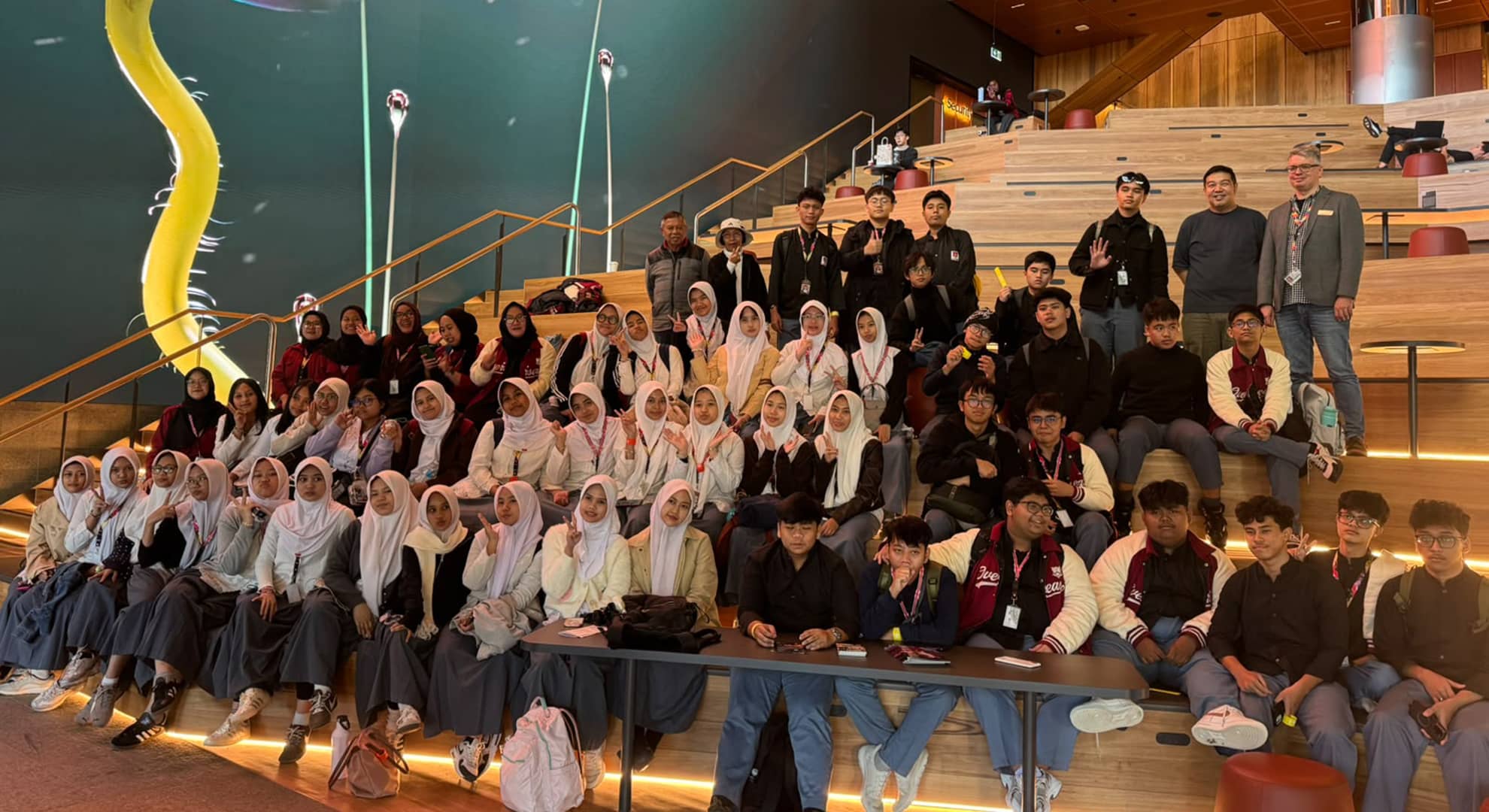 Course participants sitting on the steps at ECU City Campus