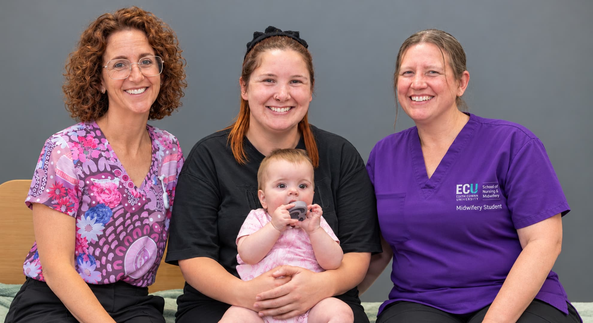 Three women and a baby