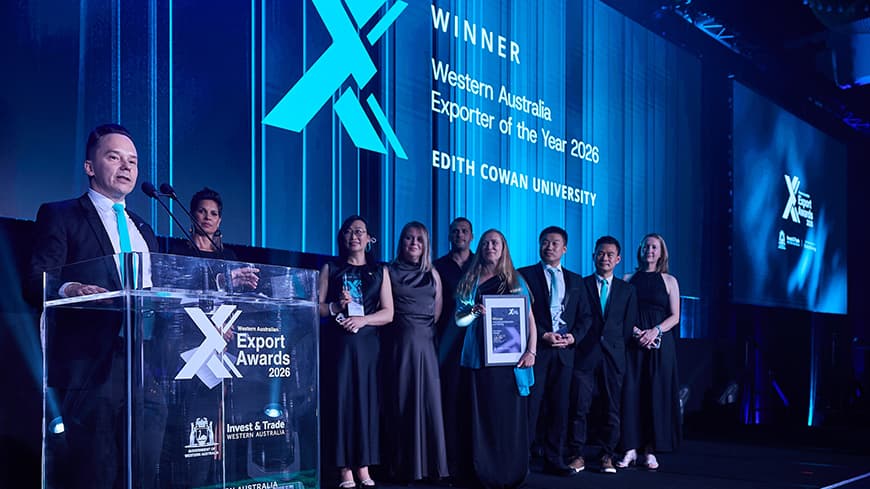 ECU accepts the 2026 WA Exporter of the Year award, the top prize of the night.