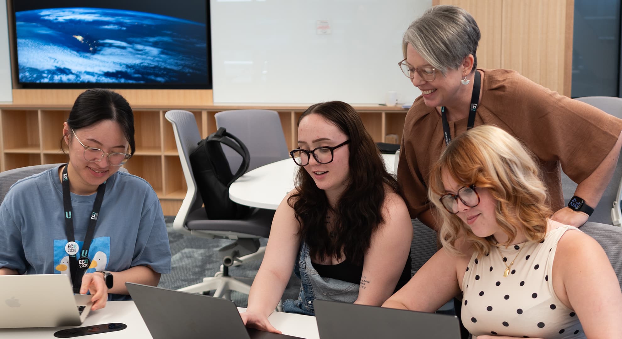 Apple Foundation Program Coordinator Lorraine Marshalsey with some aspiring app creators
