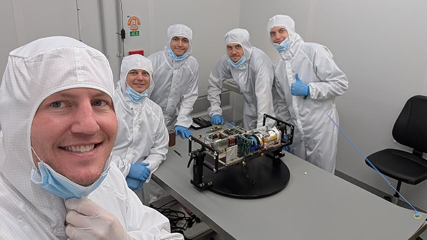 The team with the finished satellite
