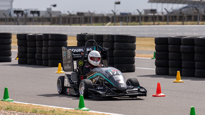 A car racing on a track