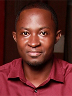 Image of an African man wearing a red shirt